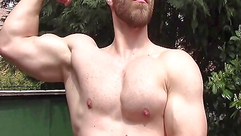 Shemale with sexy dress shows off her muscular body