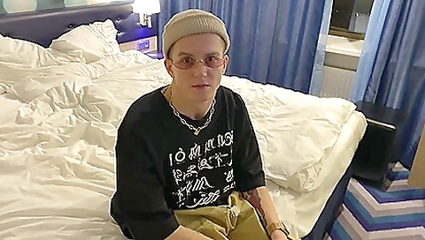 Brunette tattooed slut fucks a man in a hotel room
