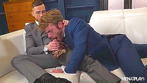 Blonde and brunette hunk in a fetish with a deepthroat