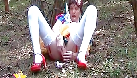 Shaved pussy teen girl riding two sex toys outdoors