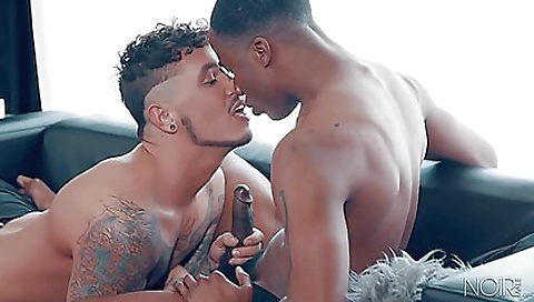 Interracial sex with a big black cock and a tattooed chick