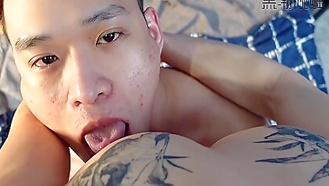 Asian redhead is sucking on his dick and having sex
