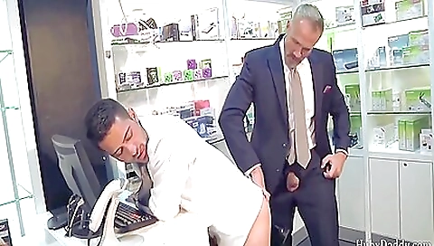 Tattooed man bangs his manhood at a convenience store