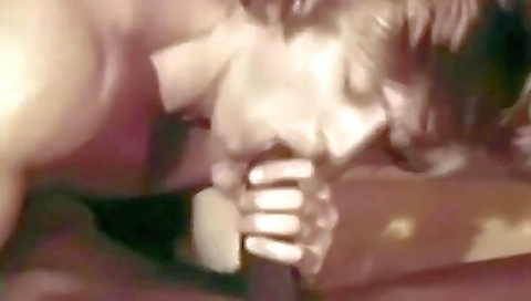 Black man deepthroats a brunette with a black dick